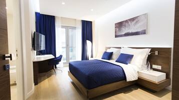 Desk, laptop workspace, free WiFi, bed sheets