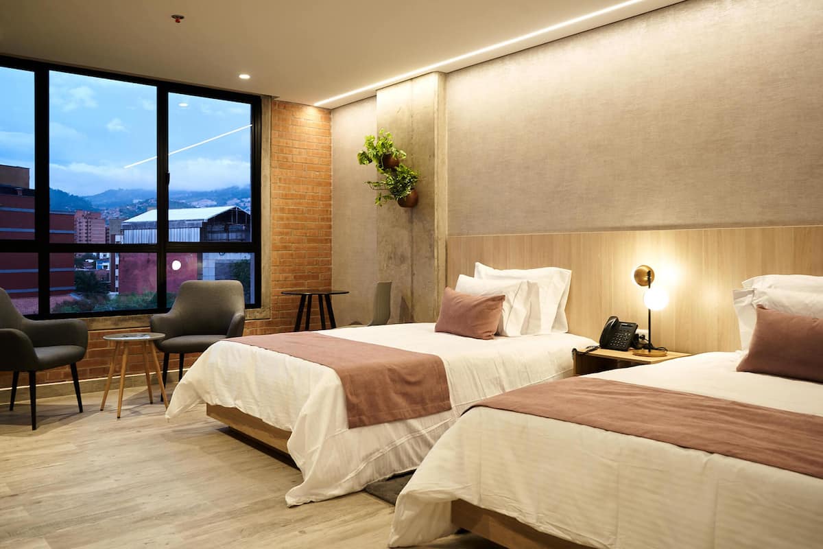 Twin Room | 1 bedroom, premium bedding, down comforters, minibar