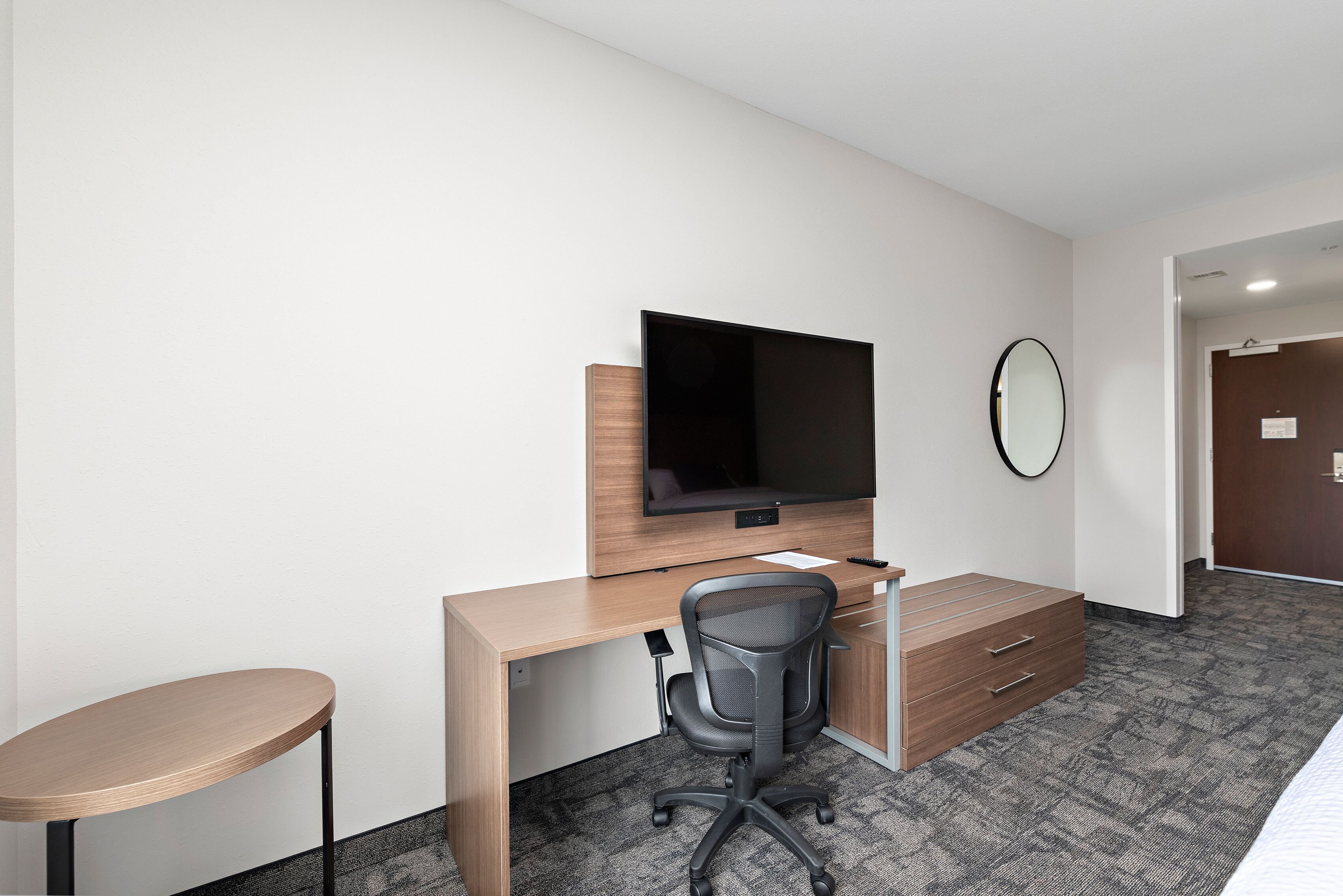 desk, laptop workspace, blackout curtains, travel cot