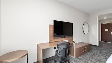 Desk, laptop workspace, blackout drapes, travel crib