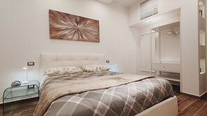 2 dormitorios, tabla de planchar con plancha, wifi gratis y ropa de cama