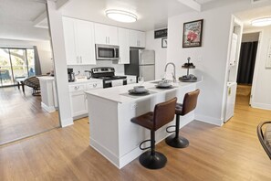 Fridge, microwave, oven, stovetop - Family-Friendly Oasis w/ Pool, Gym & Near Beach (Oceanside)