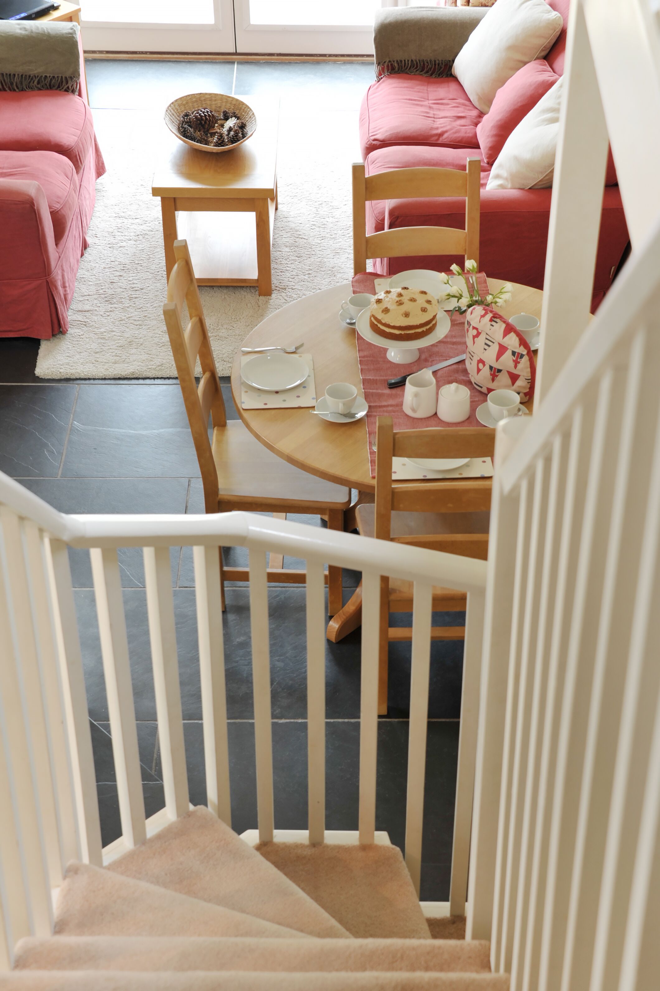 The Barn stairs leading down to the living and dining area.