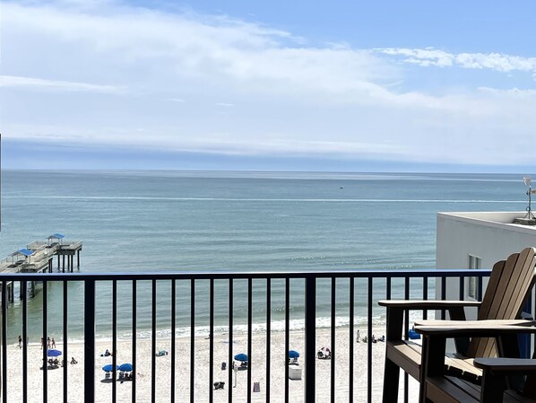 A balcony with a view of the beach and ocean. - Four Seasons 804W 2 King beds Fishing Pier Read Parking Rules new flooring (Orange Beach)