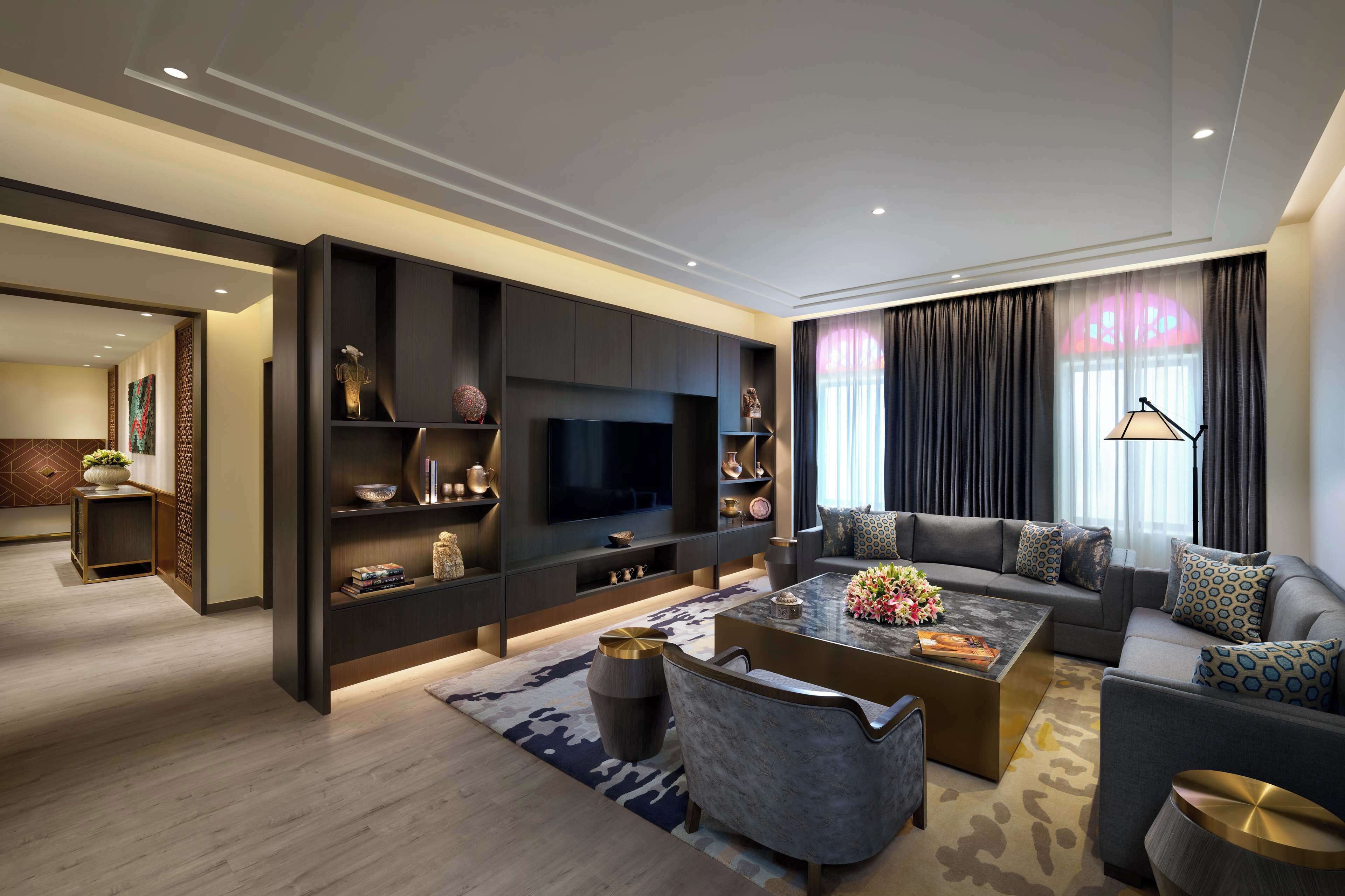 Donsdekens, een minibar, een kluis op de kamer, een bureau