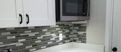 Fridge, microwave, coffee/tea maker, ice maker