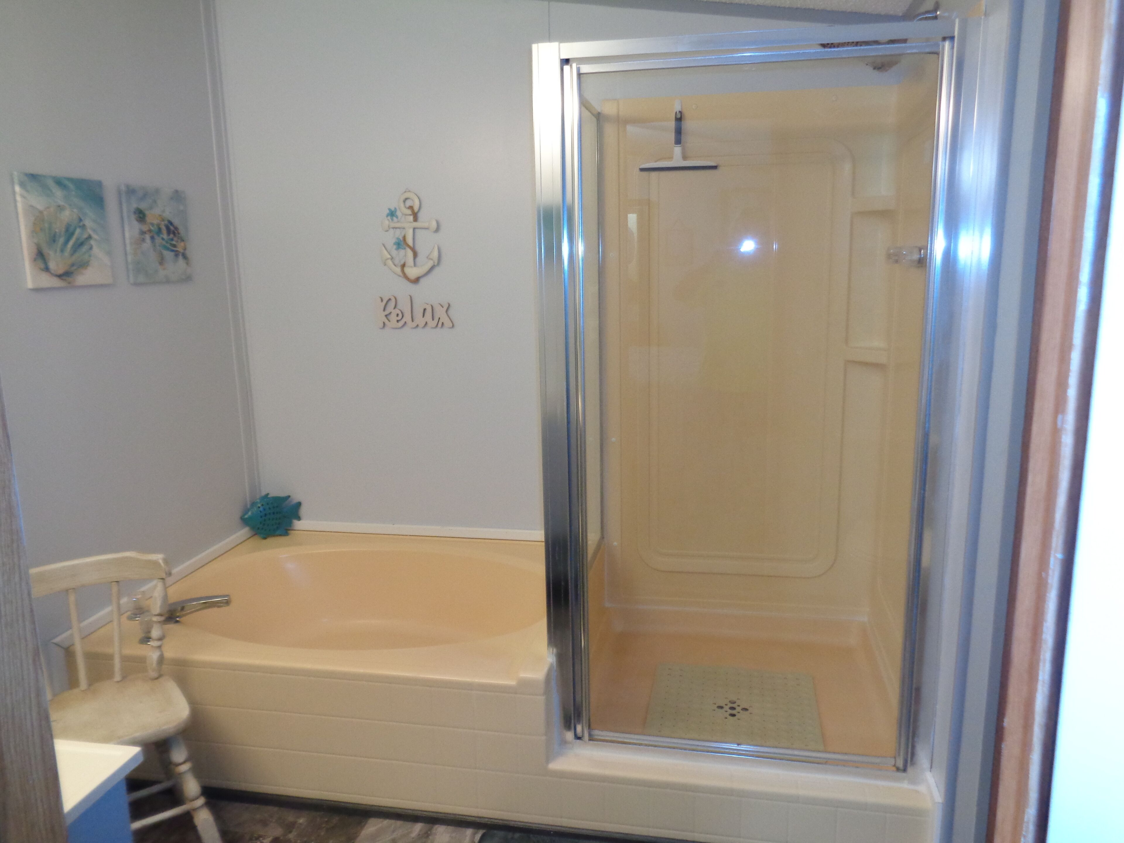 Combined shower/tub, hair dryer, towels, soap