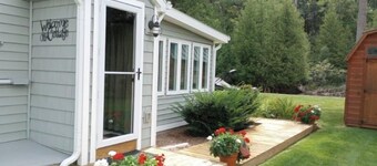 Riverfront Cottage w/ Boat Docking and easy access to Burt Lake