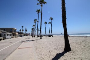 On the beach, beach umbrellas, beach towels - North Coast Village (Oceanside)
