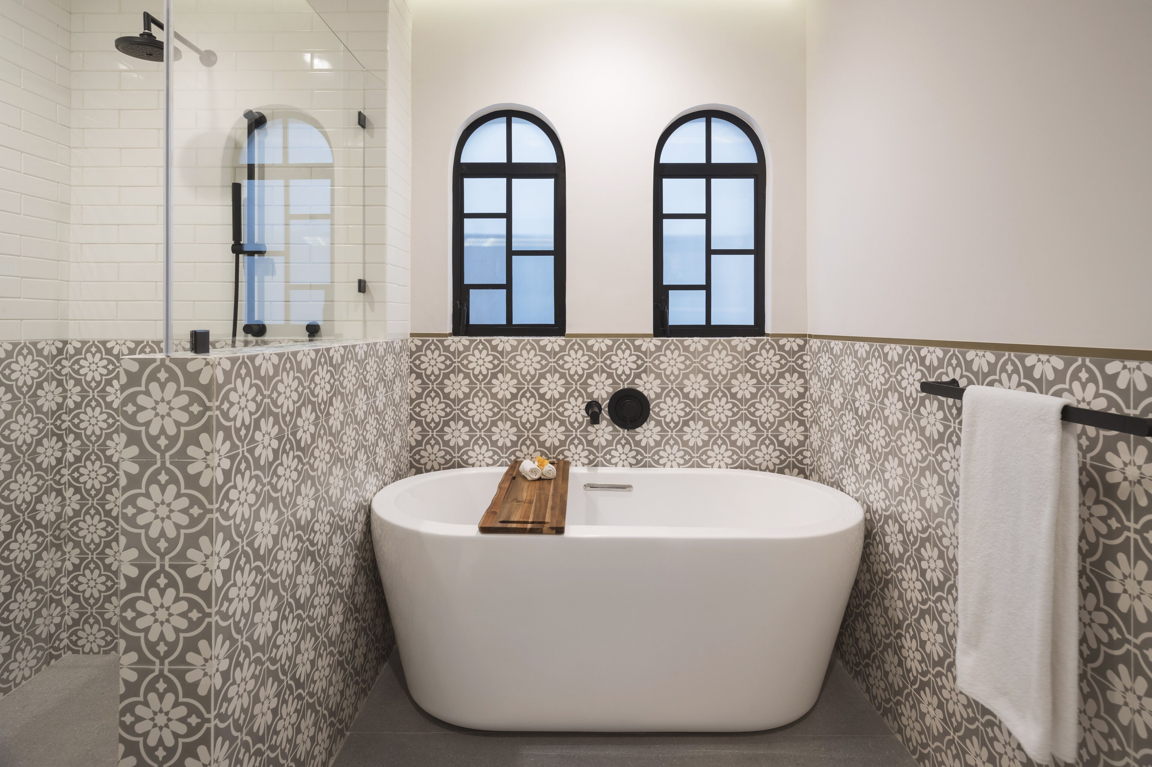 design suite | bathroom | separate bathtub and shower, hair dryer, towels