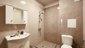 Luxury Apartment, 1 Bedroom, Smoking, Mountain View | Bathroom | Shower, free toiletries, hair dryer, slippers