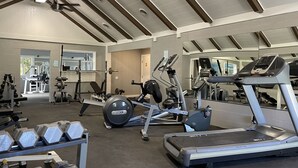 A gym with treadmills, weight machines, and free weights. - Surrey Resort  (Guerneville)
