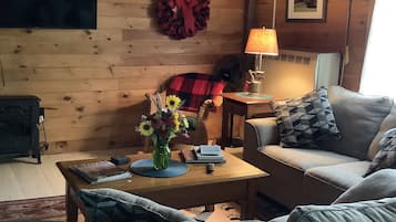 Una Smart TV, una chimenea