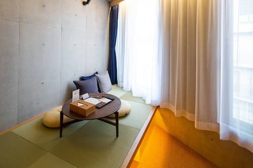 Deluxe-Dreibettzimmer, Nichtraucher (Max5 Comfort3) | Daunenbettdecken, kostenloses WLAN, Bettwäsche