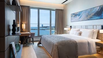 Premium bedding, down comforters, pillowtop beds, minibar