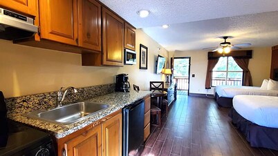 Deluxe Suite with Kitchenette and Balcony, Steps to Rodeo and Pool! 253