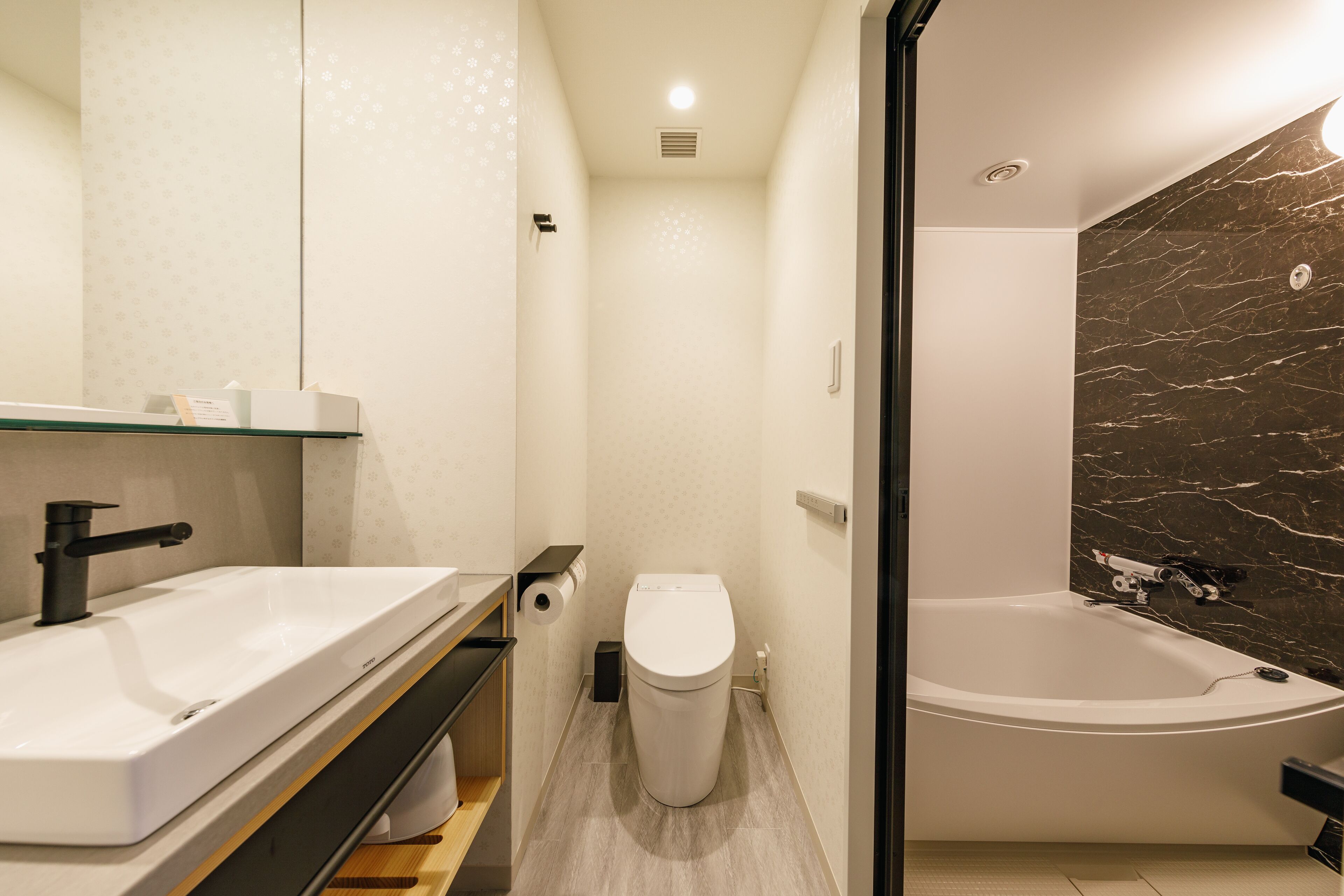 standard double room | bathroom | separate bathtub and shower, slippers, towels