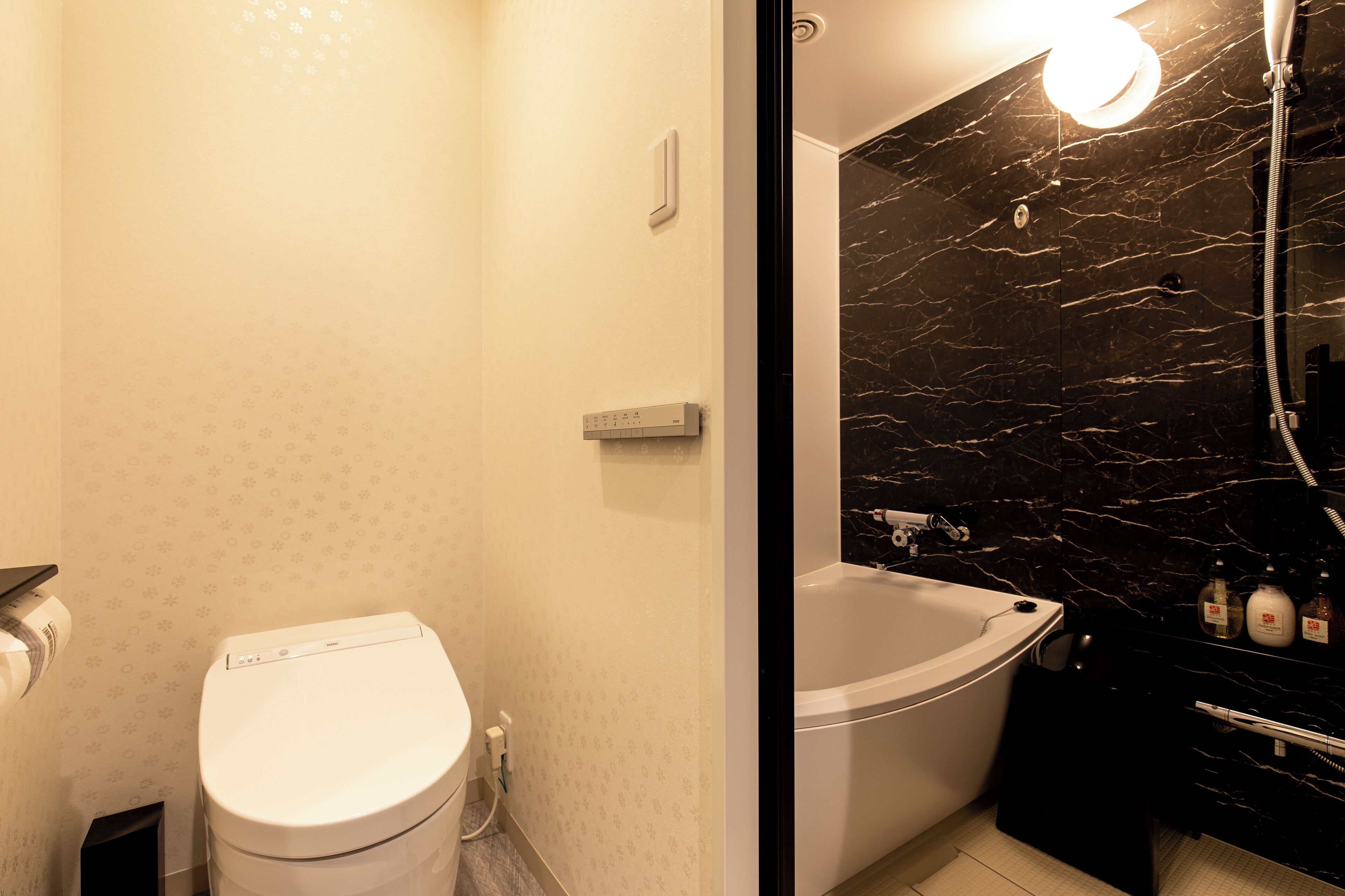 standard double room | bathroom | separate bathtub and shower, slippers, towels