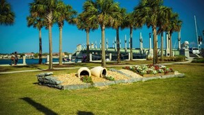 A park with palm trees, a waterfront, and a bridge. - BIG Backyard w/Terrace|Dining|Games | 6min2Beach (St. Augustine)