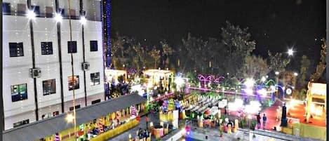 Outdoor pool, open 7:00 AM to 7:00 PM, pool umbrellas