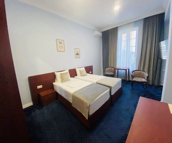 Standard Twin Room | Iron/ironing board, free WiFi, bed sheets