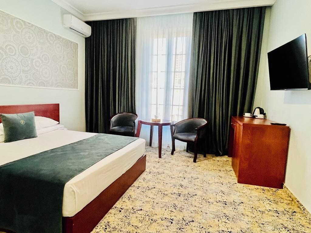 Iron/ironing board (on request), WiFi (free), bed sheets