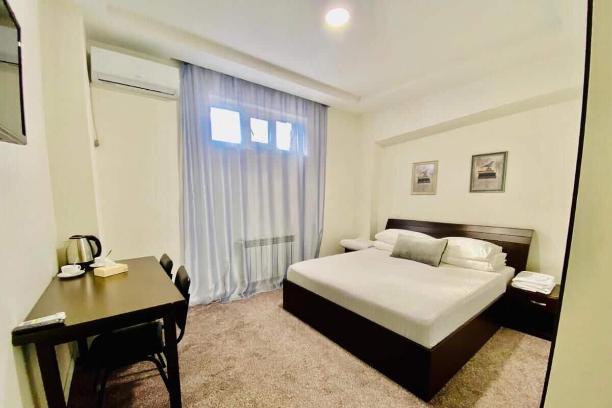 Kamar Ekonomi | Setrika/meja setrika, Wi-Fi gratis, dan seprai linen
