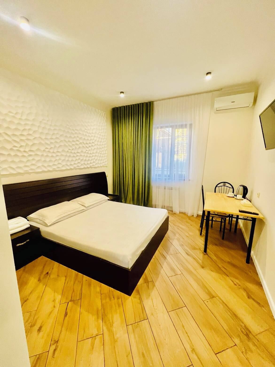 Iron/ironing board (on request), WiFi (free), bed sheets