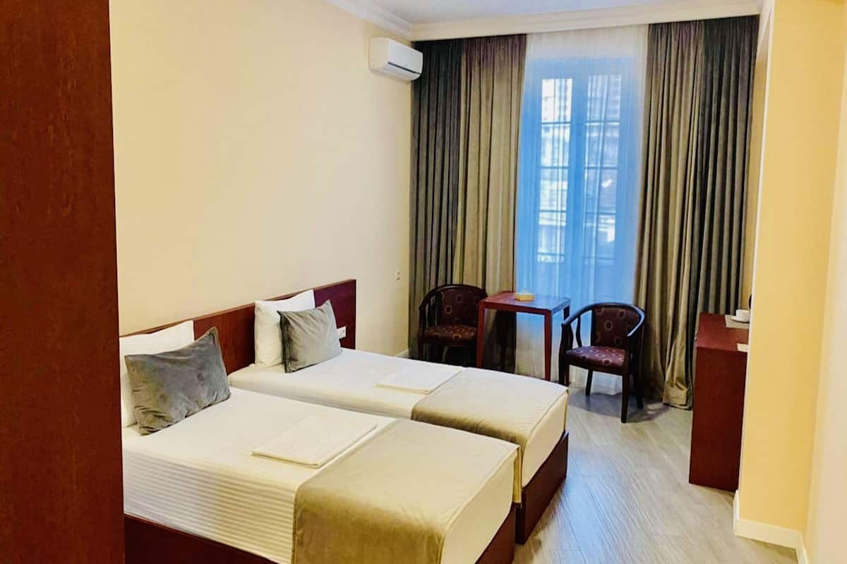 Kamar Twin Standar | Setrika/meja setrika, Wi-Fi gratis, dan seprai linen