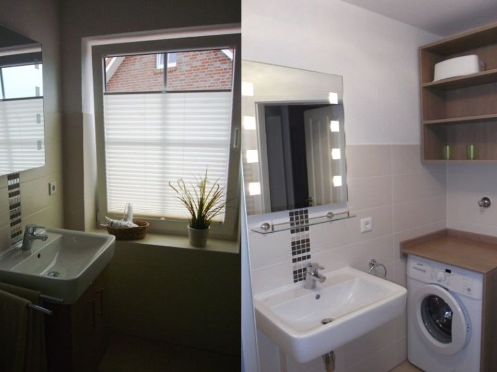 A bathroom with a sink, mirror, and washing machine.