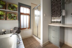 Bathtub, hair dryer, towels, soap