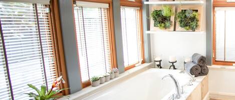 Bathtub, hair dryer, towels, soap