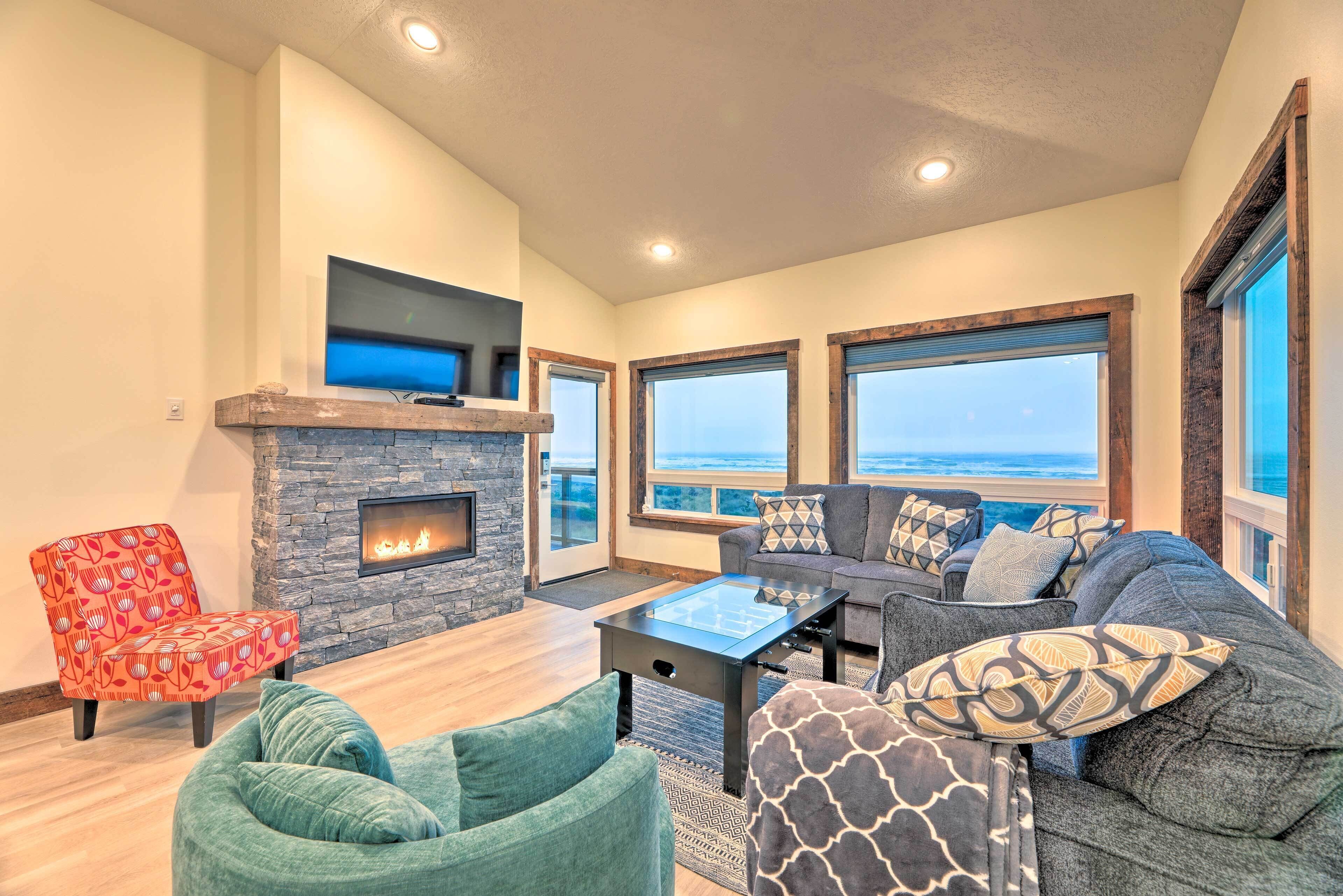 TV, fireplace, books