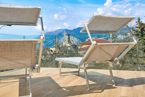 Maison de vacances Casa Titi avec vue sur le lac, jardin, terrasse privée et Wi-Fi