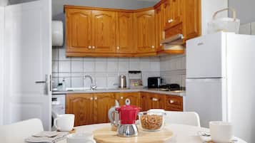 Een koelkast, een magnetron, een kookplaat