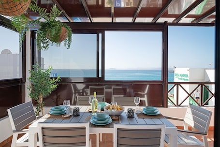 Outdoor dining. Apartment "La Estrella" Near Beach with Panoramic Sea View, Terrace, A/C & Wi-Fi