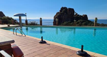 Apartamento Villetta L'Estasi - Tanca Piras con vistas al mar, piscina y Wi-Fi