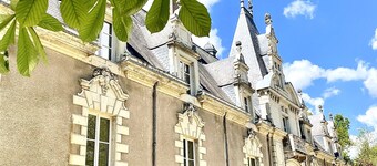Lavishly decorated double room at Château Le Fresne
