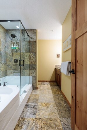 Bathtub, hair dryer, towels, soap