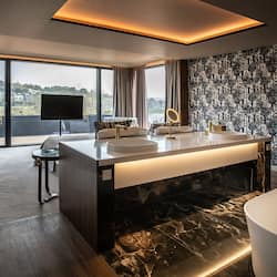 Egyptian cotton sheets, premium bedding, down comforters, minibar