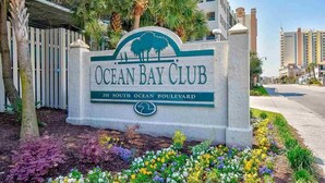 A sign for Ocean Bay Club at 201 South Ocean Boulevard.