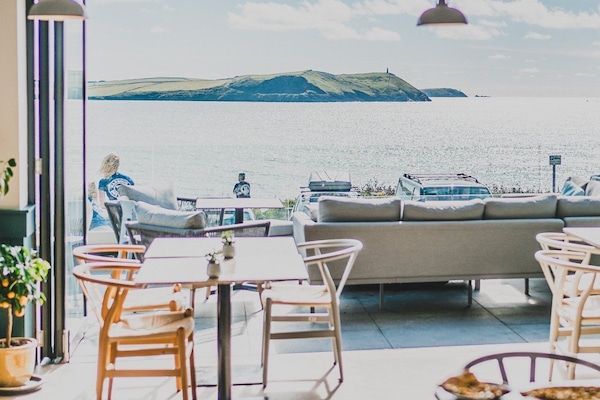 Breakfast, lunch, dinner served; beach views