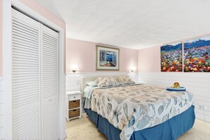 1 bedroom, desk, iron/ironing board, travel crib