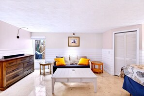 1 bedroom, desk, iron/ironing board, travel crib