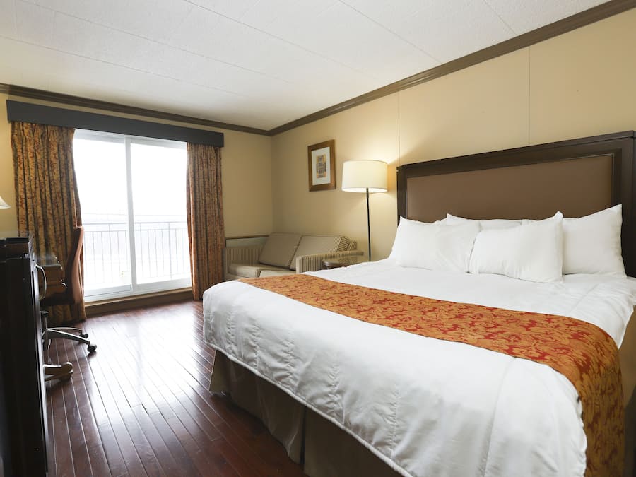 King Room (Upper floor) | Skrivebord, blendingsgardiner, strykejern/-brett og wi-fi (inkludert)