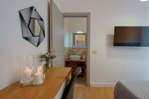 Comfort Room, 1 Bedroom, Balcony, City View | 1 bedroom, memory foam beds, desk, laptop workspace