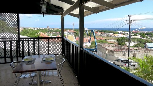 Studio with a big terrace, ocean views + Pool