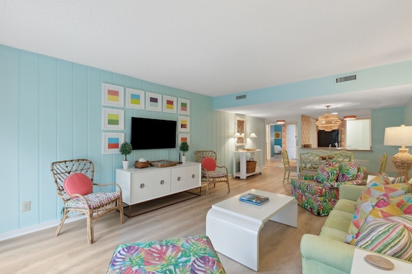 Gorgeously Furnished Living Space with Flat Screen TV and Sleeper Sofa