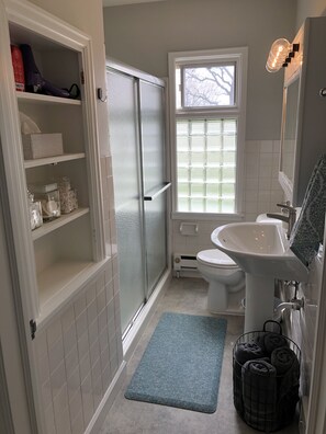 Shower, hair dryer, towels, soap
