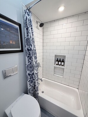 Combined shower/bathtub, hair dryer